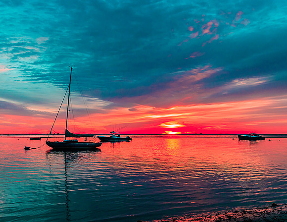 Sailboat at sunrise Chatham
